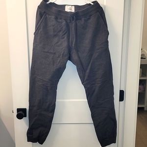 REIGNING CHAMP MIDWEIGHT TERRY SLIM SWEATPANT